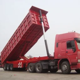
										3 Axle dump semi trailer full									