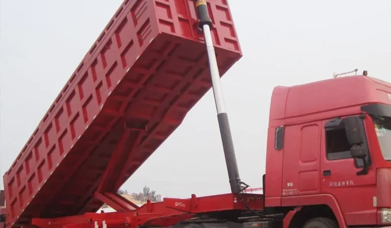 
								3 Axle dump semi trailer full									